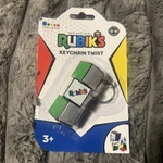 Spin Master Toyzon The Official Rubik's Cube Keychain Twist Fidget Rubiks. Fixed Price $7.00.