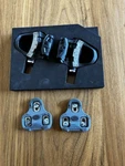 Garmin Rally Look Conversion Pedal Set With Cleats And Accessories Used. Fixed Price $250.00.