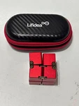 Lifidea Infinity Fidget Cube Red Metal Desk Toy W/ Case For Anxiety Adhd Ocd. Fixed Price $22.99.